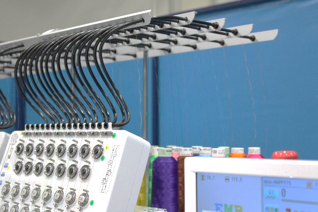 HCT upper thread feed system